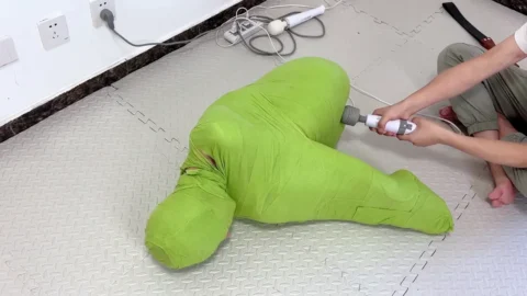 Green Mummy Sitting Helpless