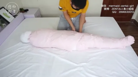 Wrapped by Husband into a Mummy