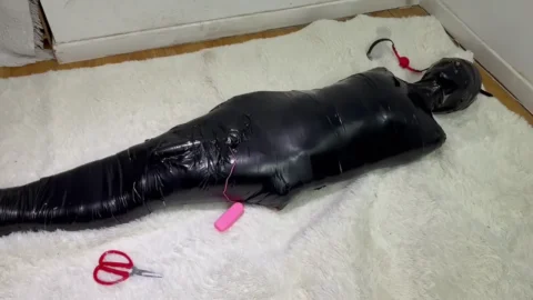 Tightly Wrapped In Black Duct Tape